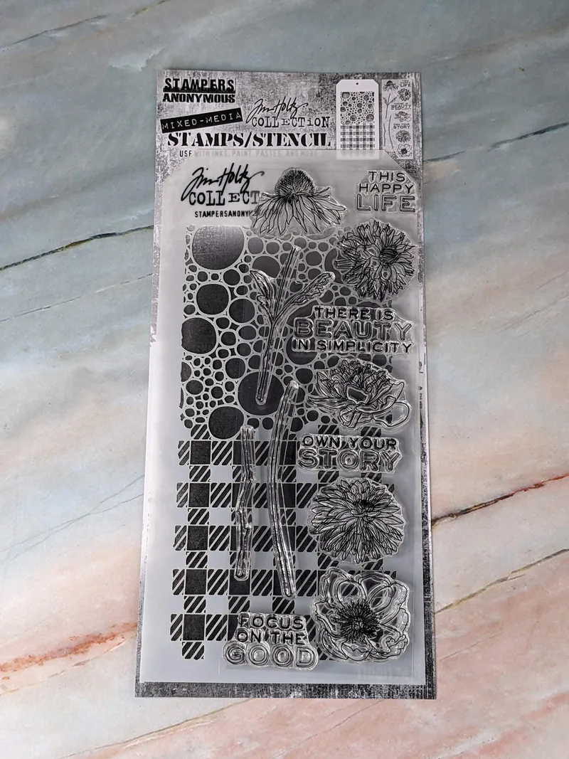 A set of Tim Holtz flower stamp and patterned stencils featuring bubbles and gingham designs.