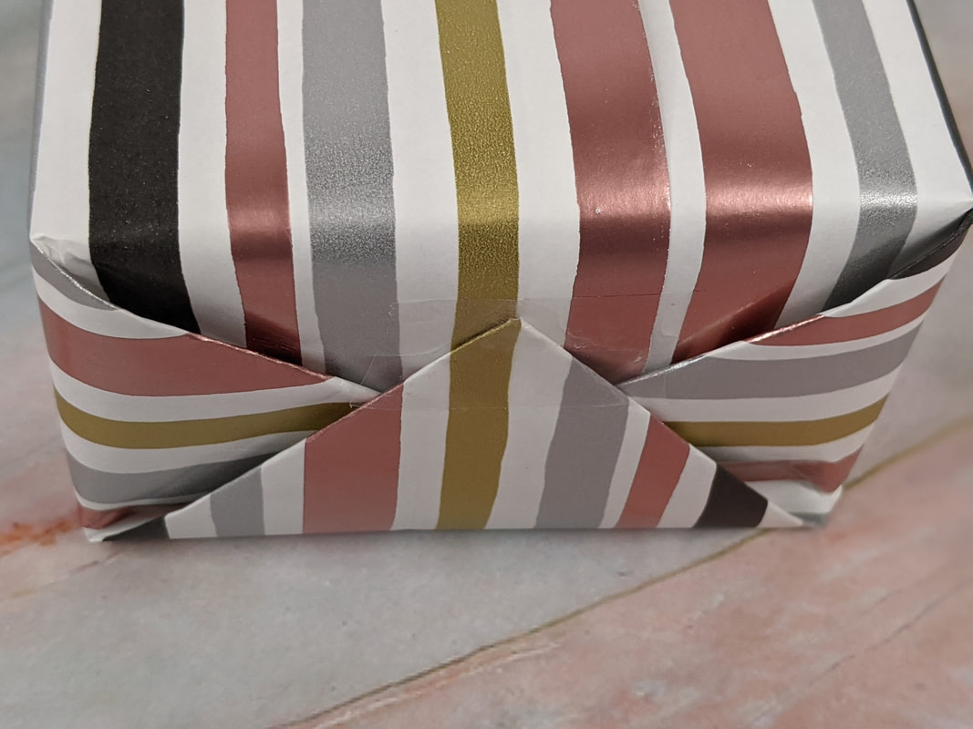 Learn How to Wrap a Gift